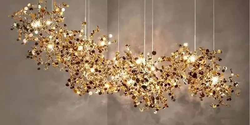 Large hotel chandelier structure supporting a flowing arrangement of glass pieces Large hotel chandelier structure supporting a flowing arrangement of glass pieces
