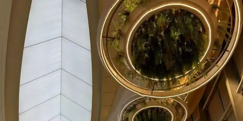 Continuous concealed light lines integrated into circular bespoke hotel lighting