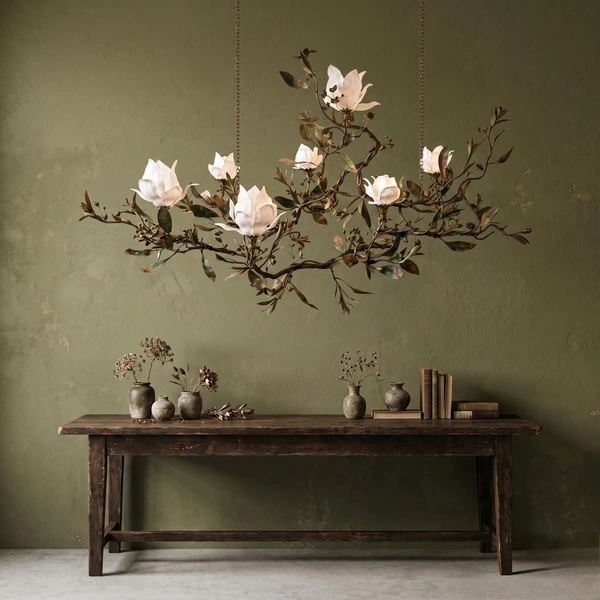 Floral branch chandelier with white blossoms above a console table Floral branch chandelier with white blossoms above a console table