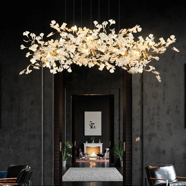 White floral branch chandelier suspended in a dark framed interior White floral branch chandelier suspended in a dark framed interior