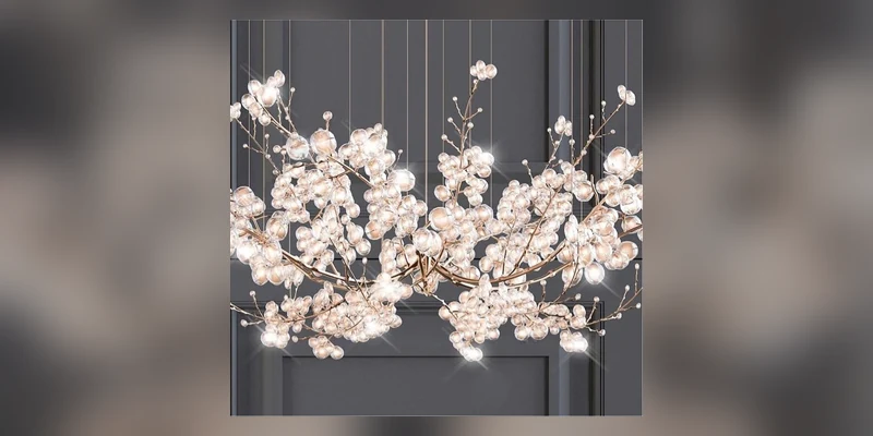 Organic lighting design with controlled natural variation in suspended glass elements