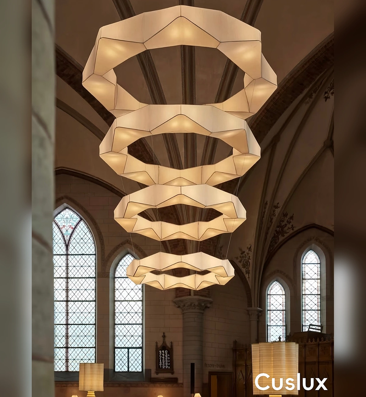 1789696022294537.webp layered fabric ceiling light with origami inspired design.webp