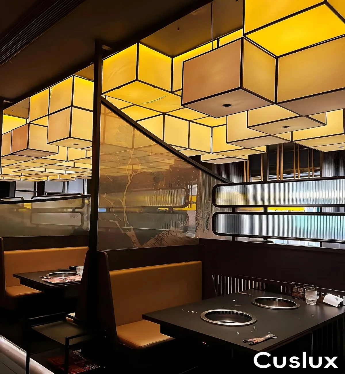Staggered arrangement of illuminated cube light boxes.webp